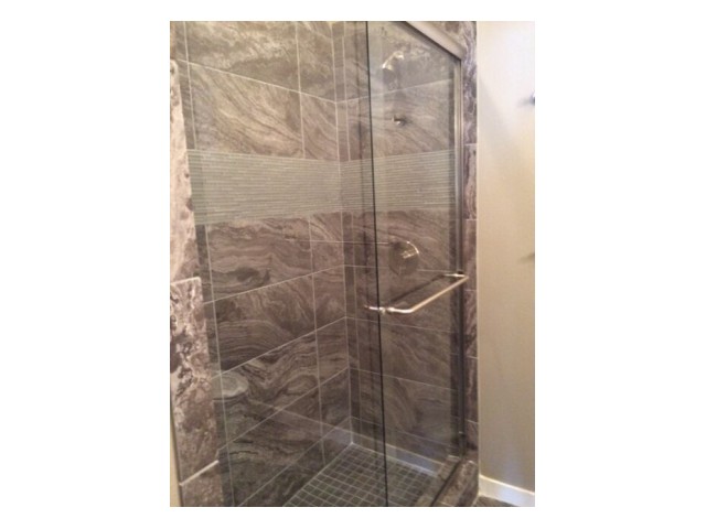 Image of Glass Shower Enclosures for Santi Dwellings at Montecillo
