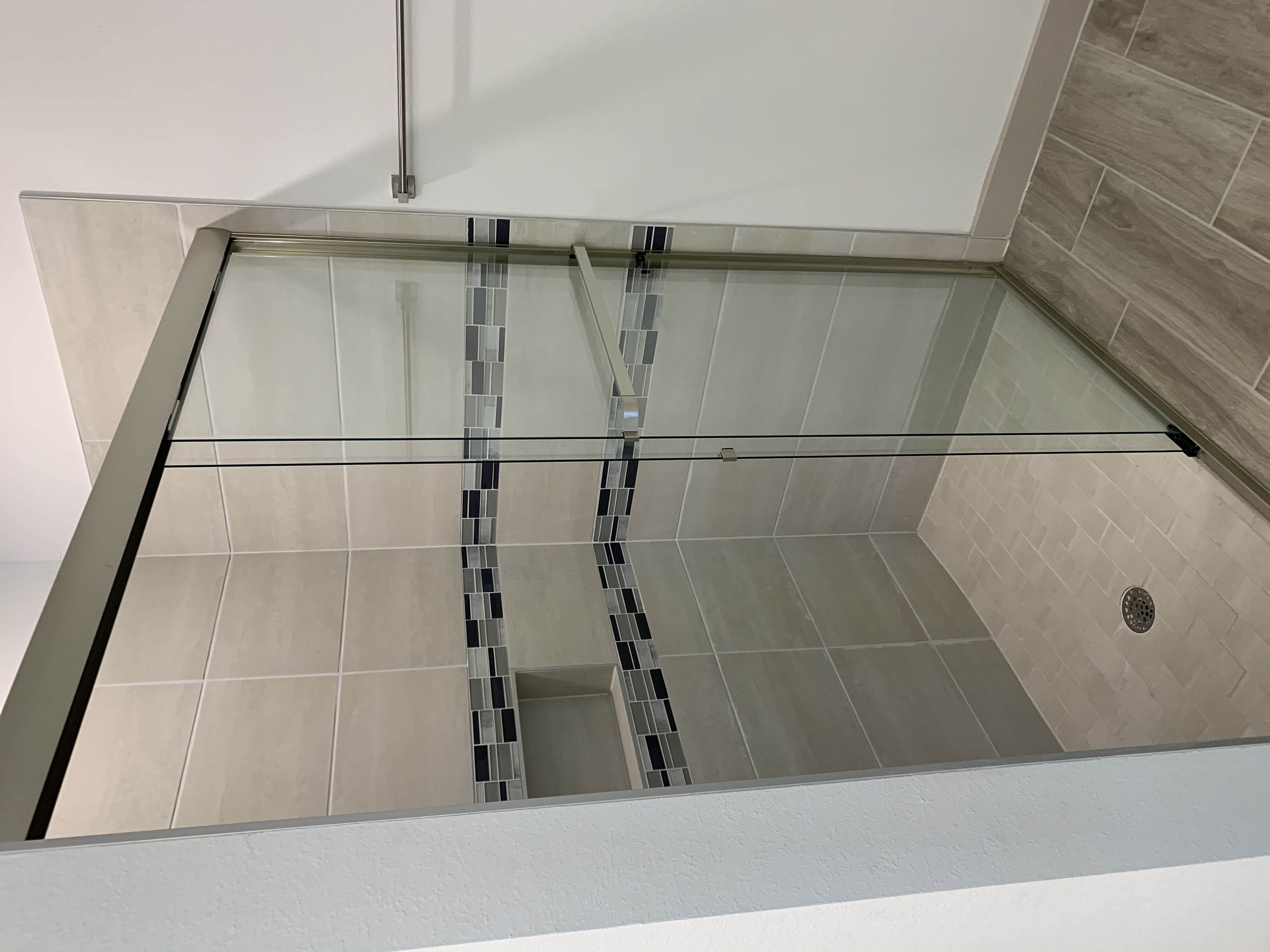 Custom Tile Surround With Glass Shower Doors