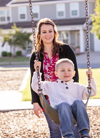 Mom and child on a playground