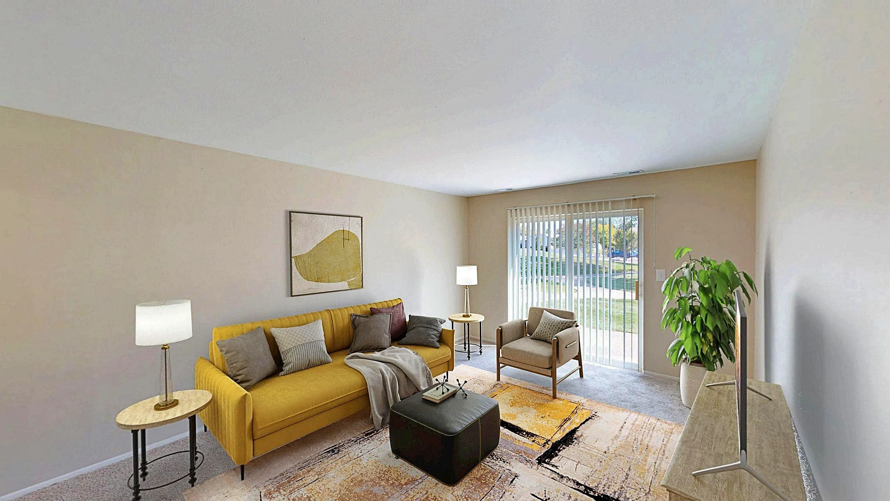 Bright and inviting living room with a vibrant yellow sofa, contemporary decor, and large window offering a scenic view.