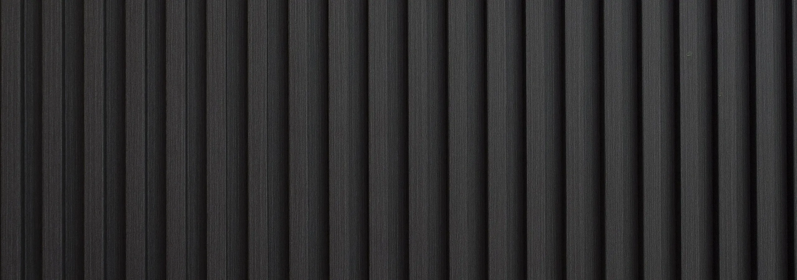 Sleek modern wall panel with vertical dark grey stripes, adding a touch of elegance to sophisticated interiors.