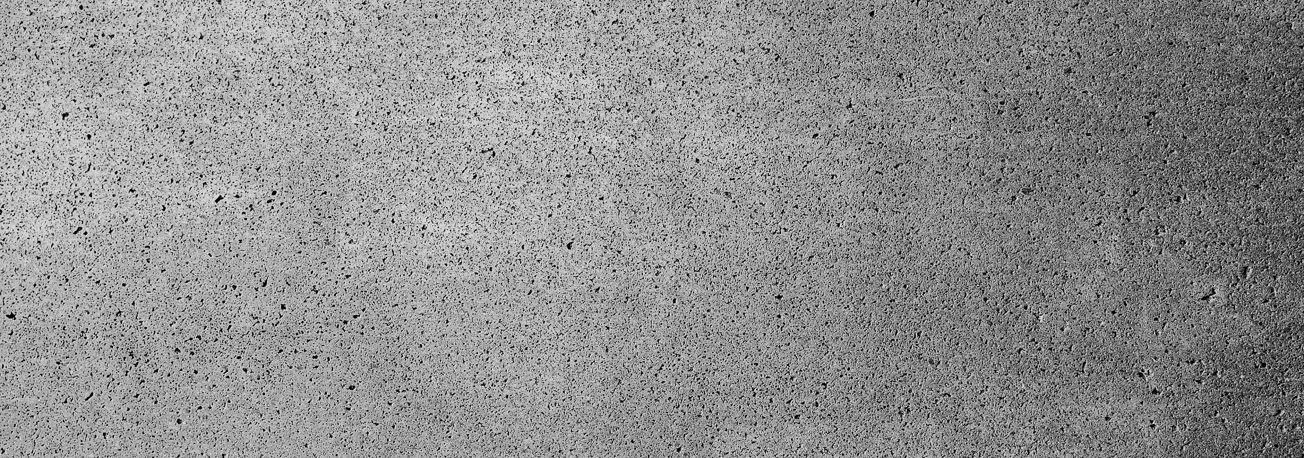 Textured urban concrete wall, perfect for sleek and modern apartment designs.
