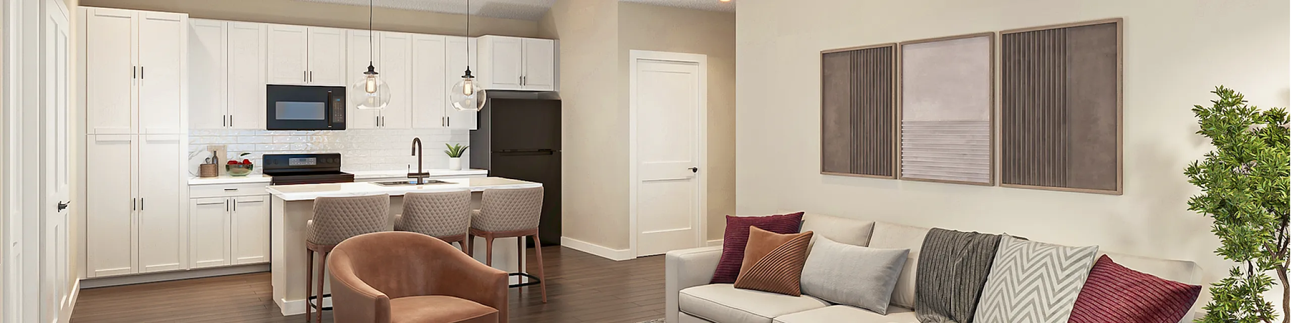 Contemporary open-concept living room and kitchen with elegant white cabinetry, stylish seating, and warm wooden flooring. Perfect blend of comfort and modern design.