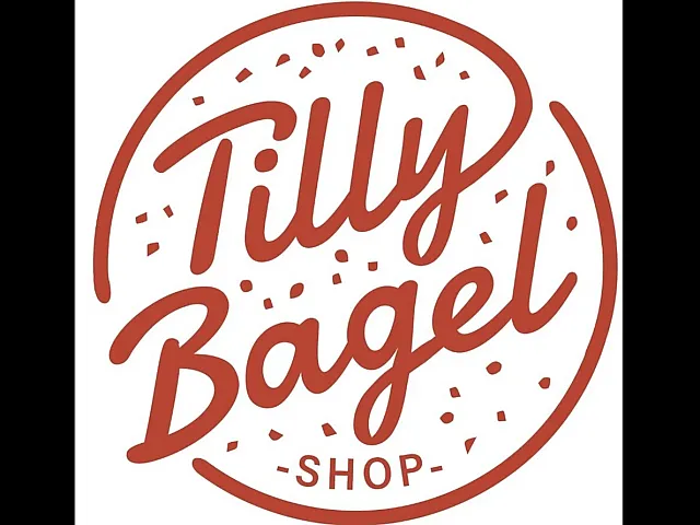 Charming circular logo design, featuring 'Tilly Bagel Shop' in warm red script, surrounded by festive confetti accents.