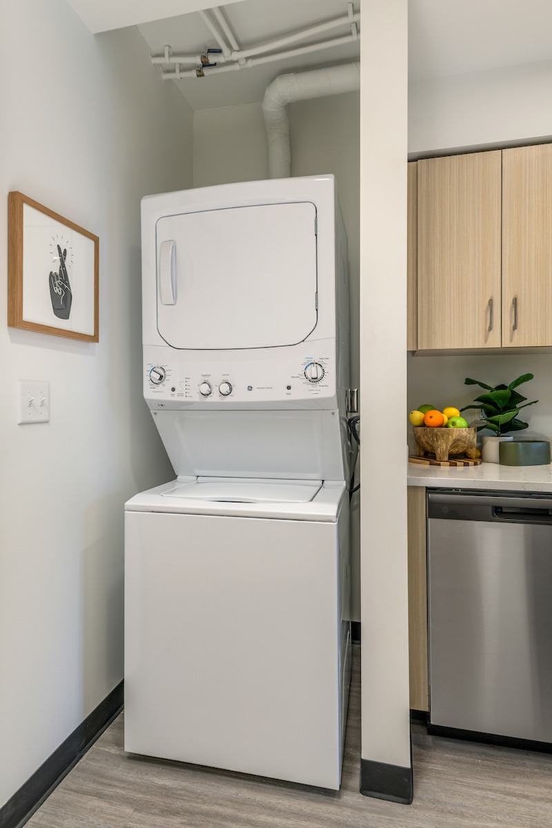 Stackable washer & dryer in model apartment