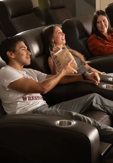 Students watcing movie in the theatre