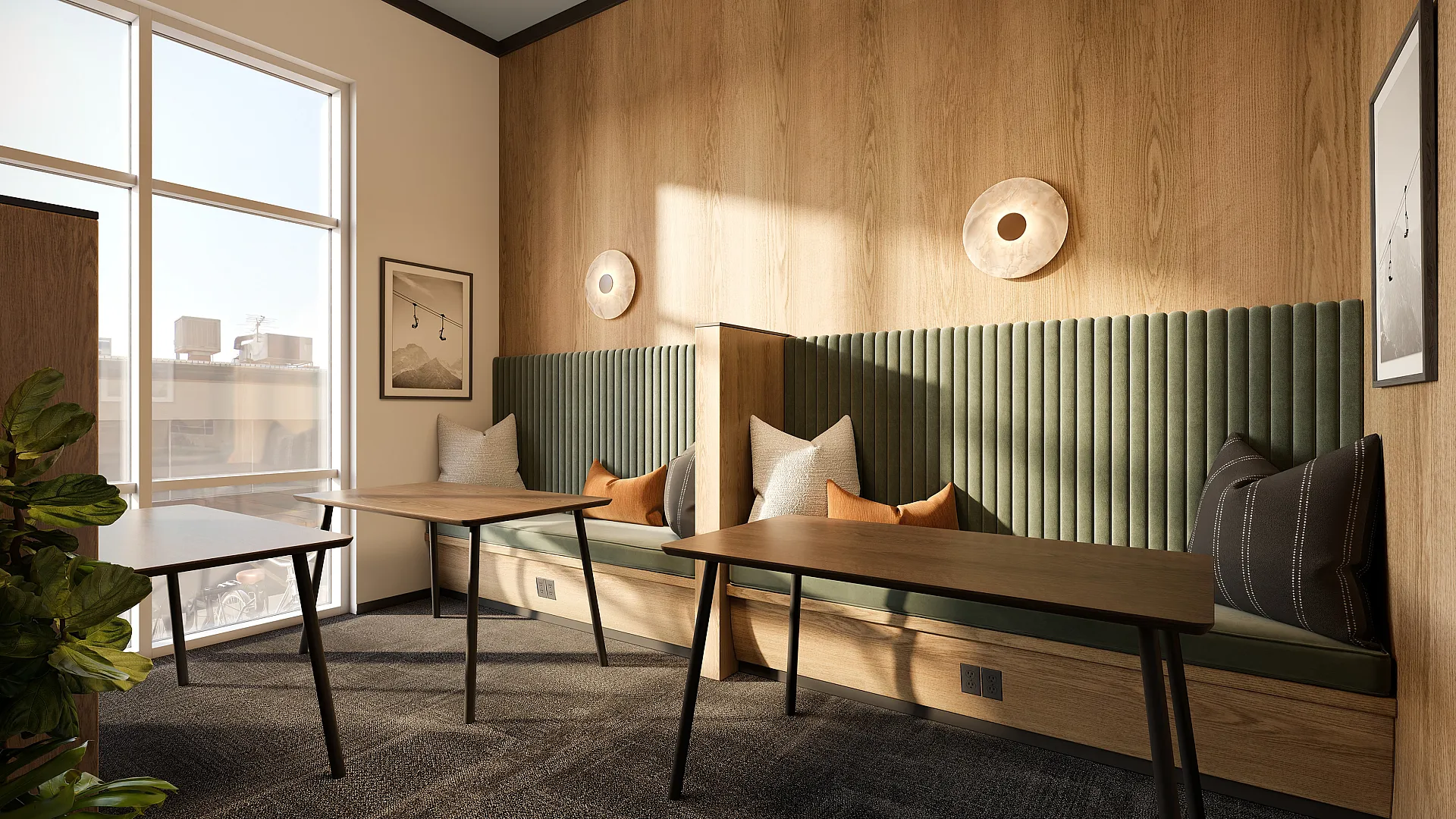 Modern communal workspace with elegant wood paneling, cozy bench seating, and abundant natural light from large windows.