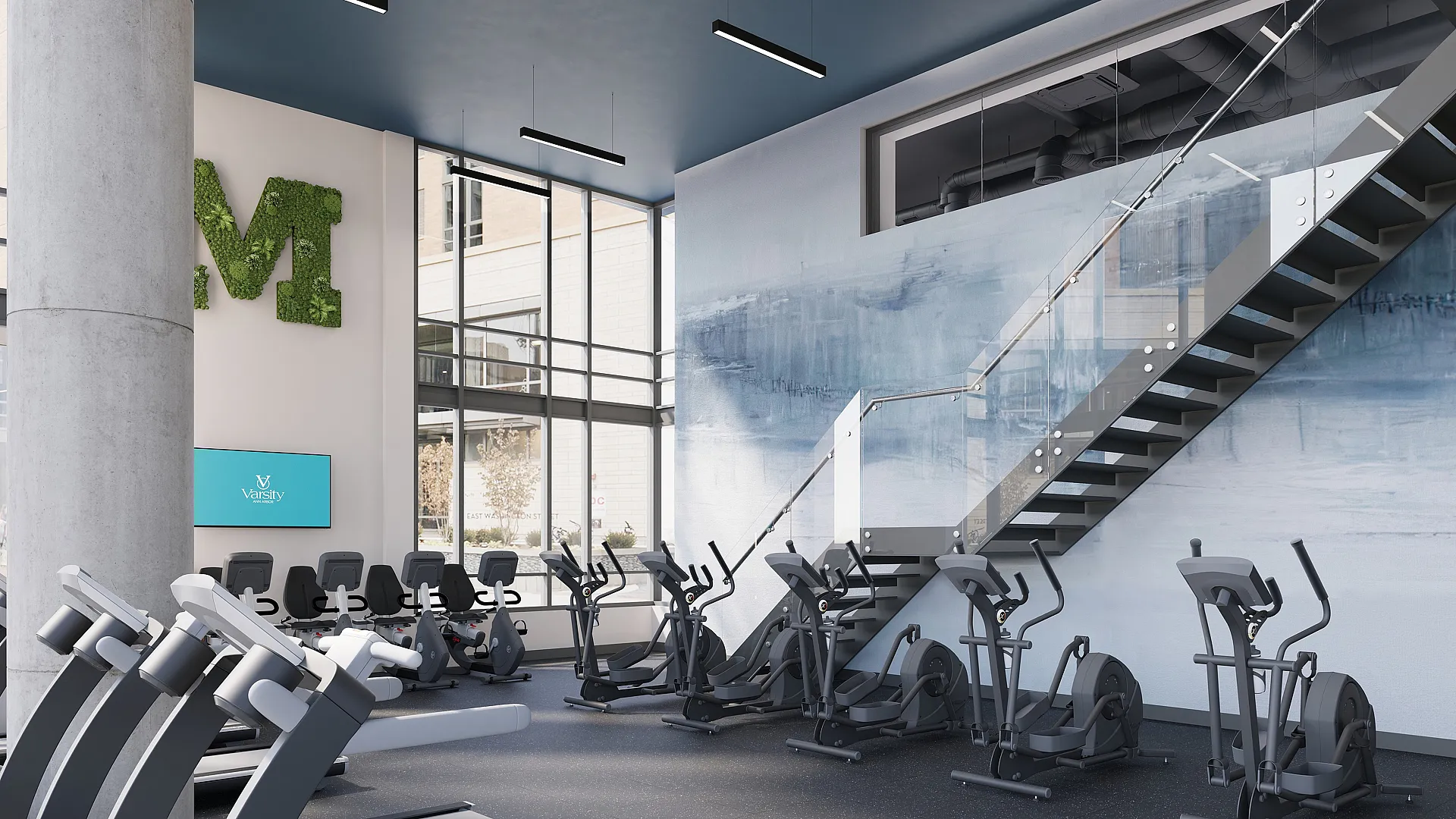 Modern gym with state-of-the-art exercise equipment, vibrant mural, and sleek glass staircase, offering a stylish fitness experience.