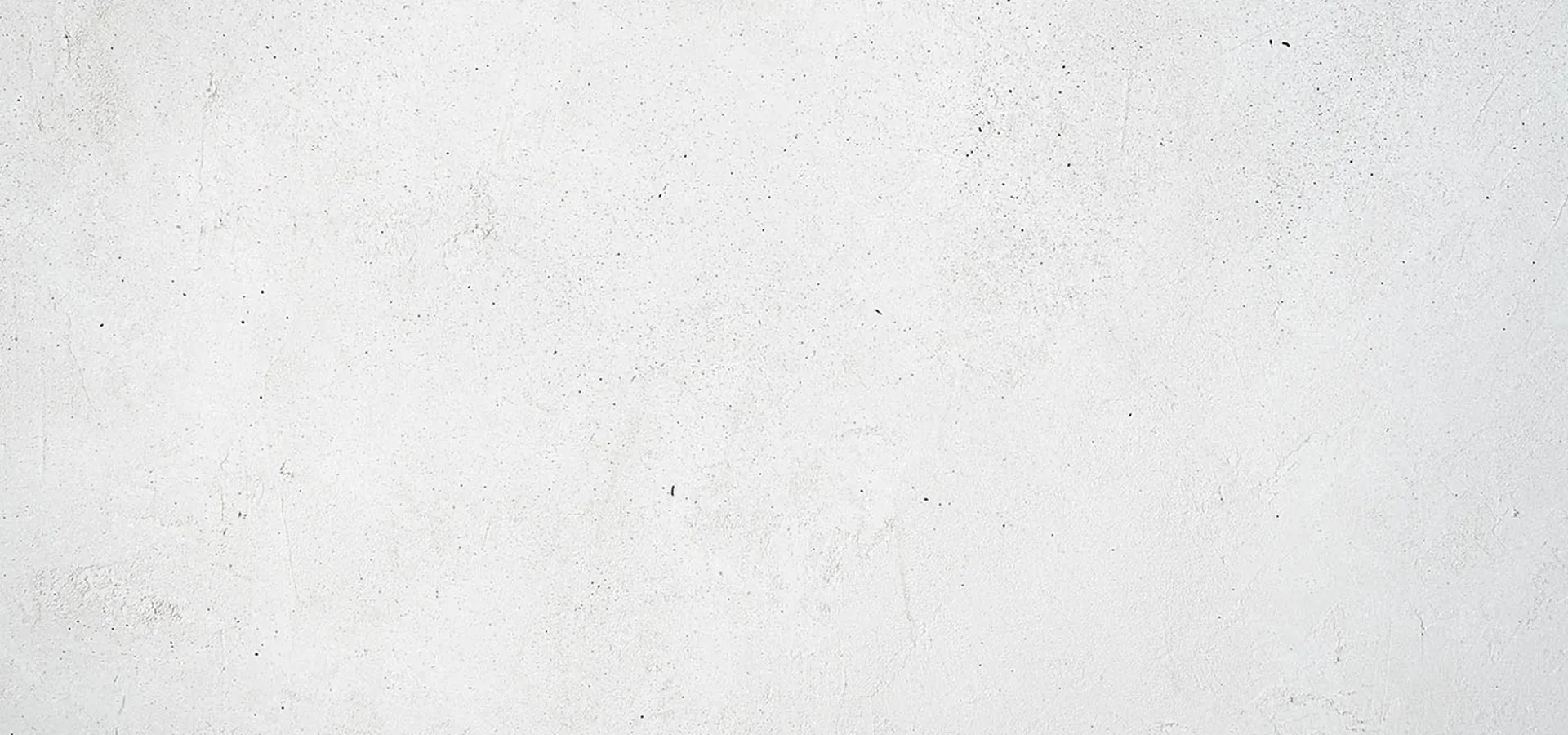 Elegant minimalist textured white wall perfect for modern interior design inspiration.