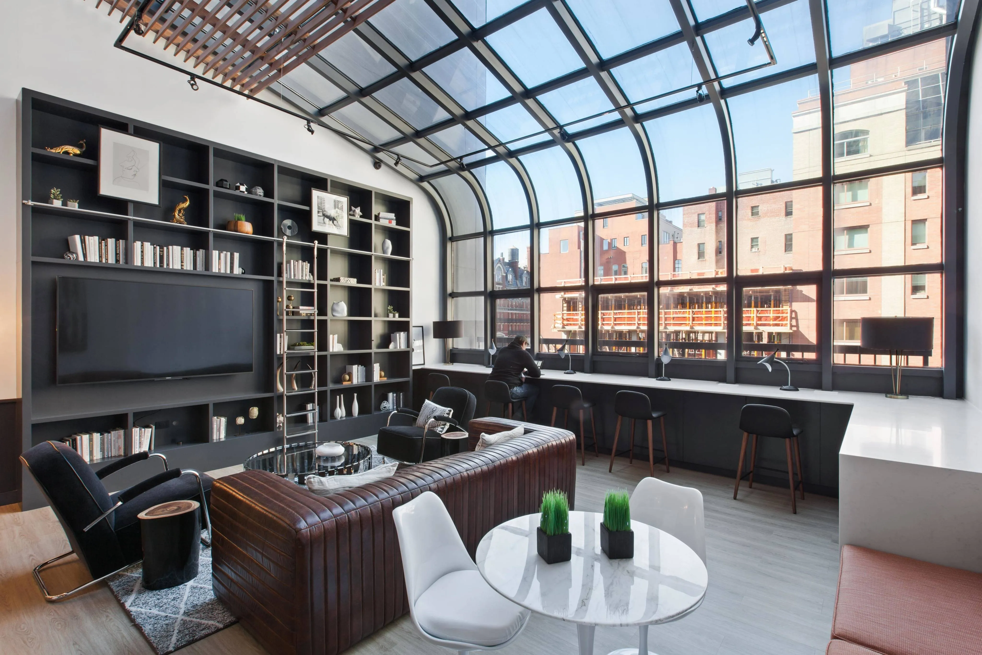 Resident study lounge with workstations and TV