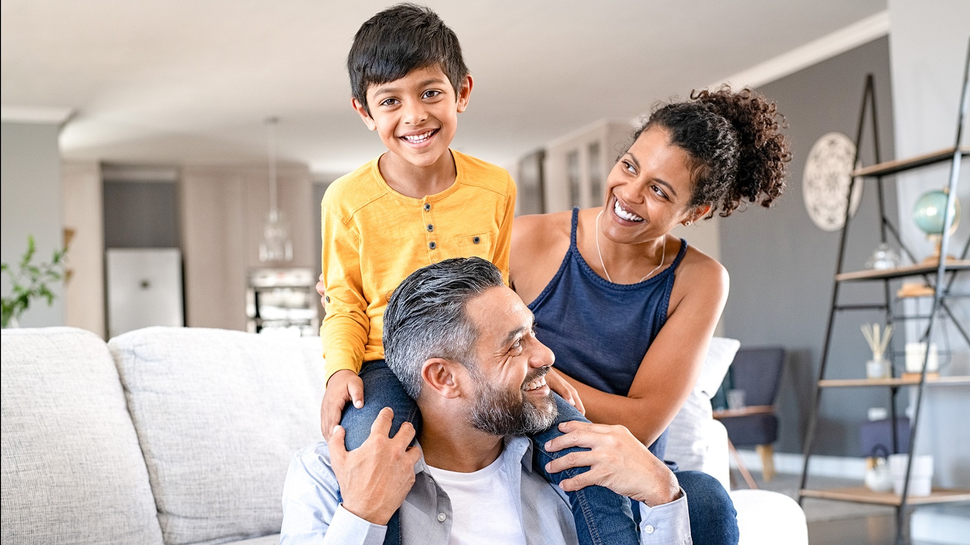 family laughing in living room