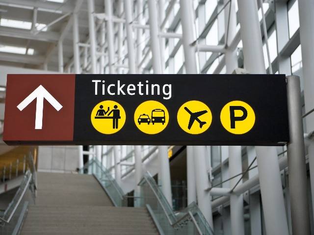 airport sign to ticketing
