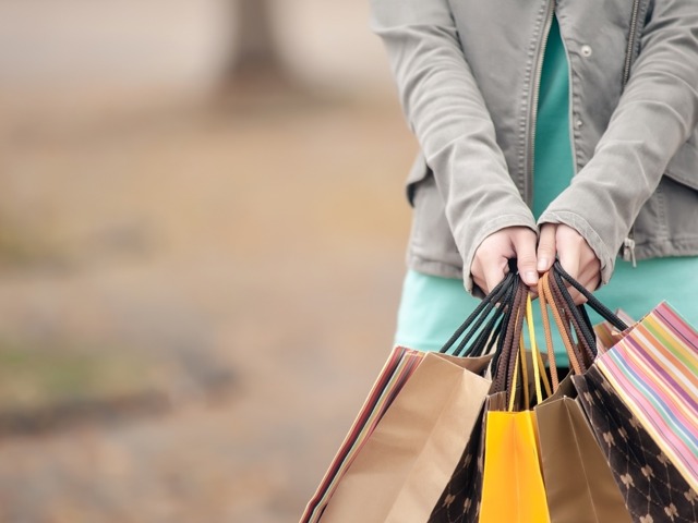 Woman shopping with multiple bags