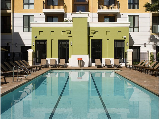 Resort-inspired Heated Pool with Spa and Cabanas