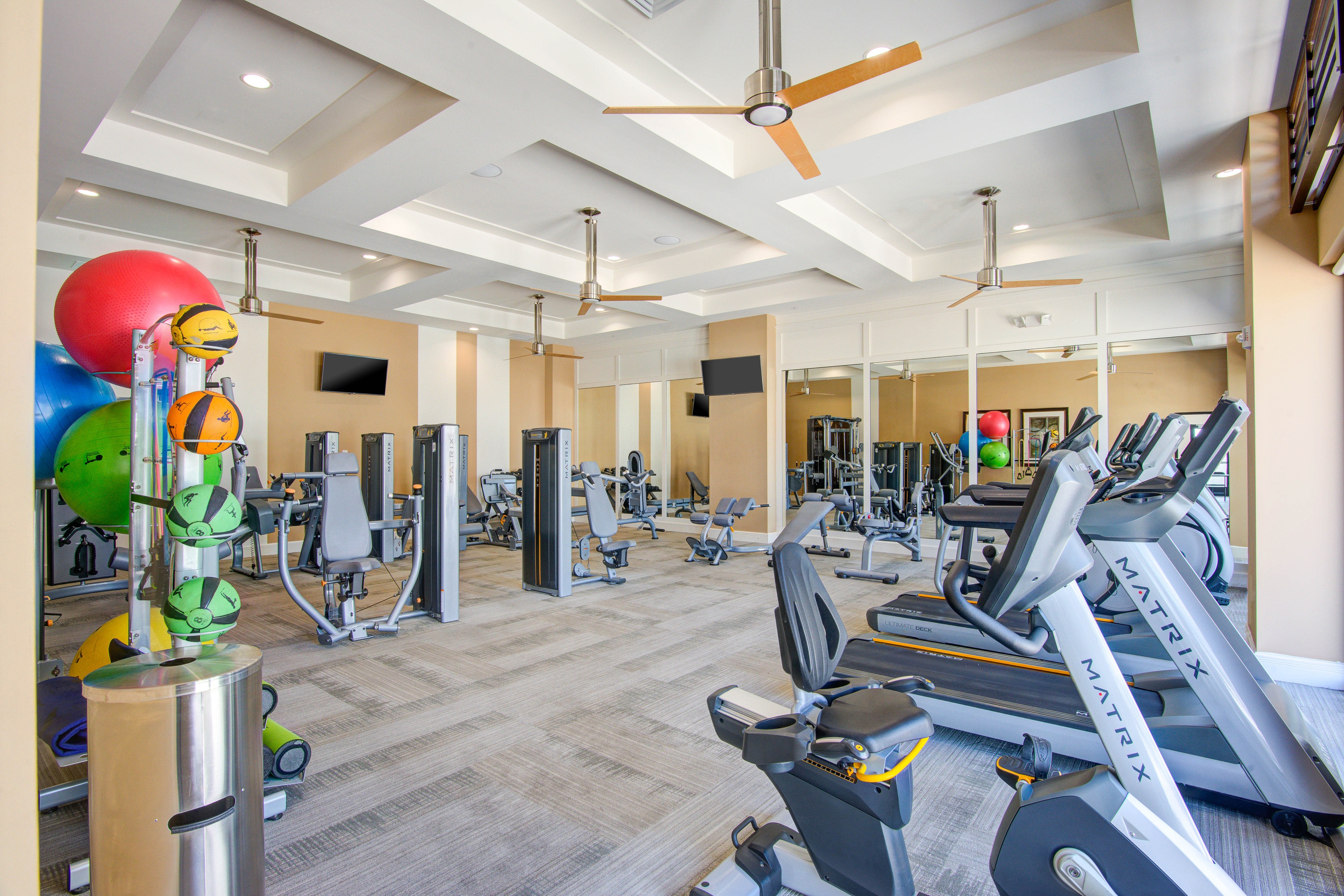 24-hour fitness club with cardio suite and weight-training area and amazing pool views