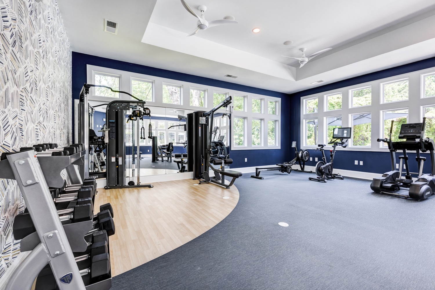 24-hour fitness center with cardio, resistance training, and free weights