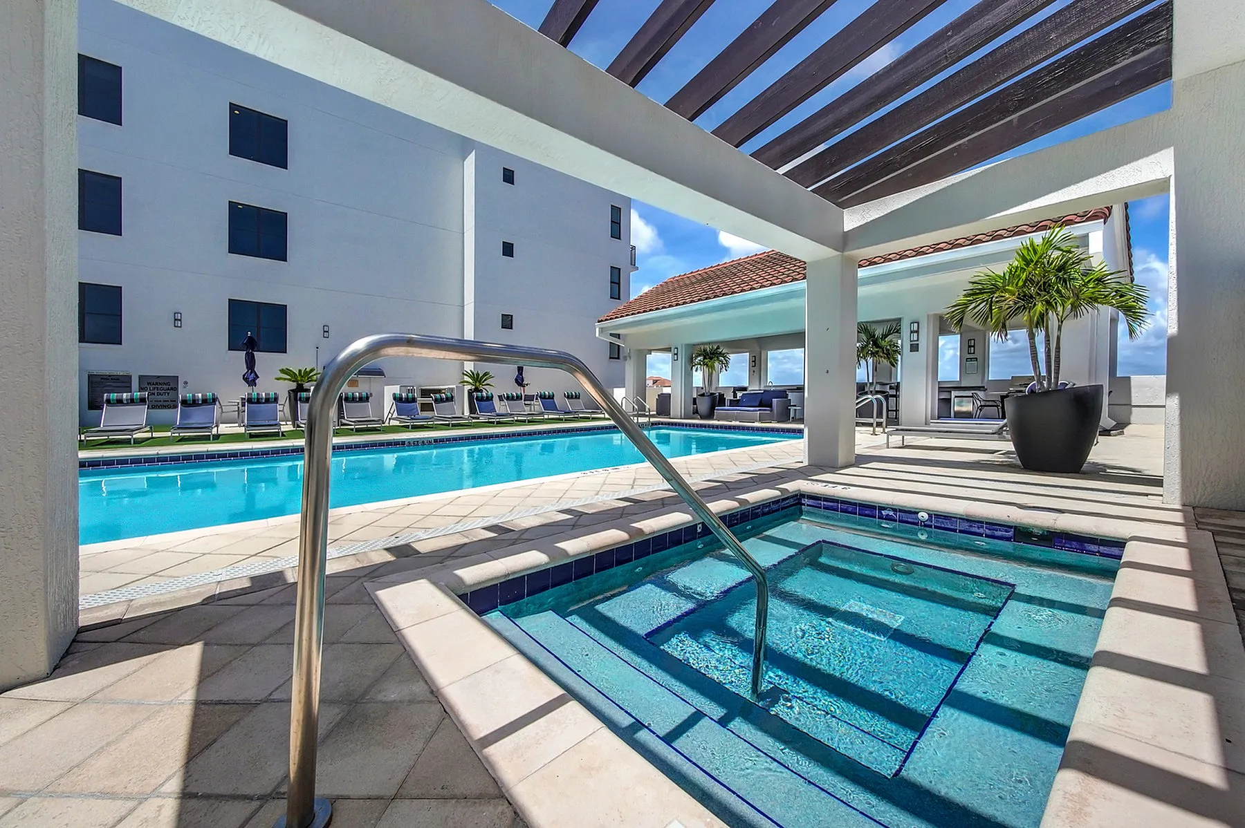 Sky view pool and jacuzzi spa with private cabanas