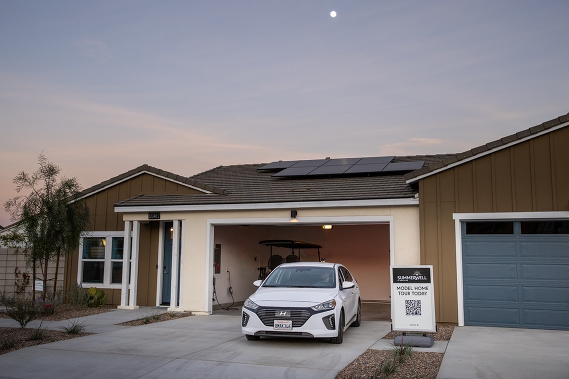 Single family home featuring attached garage