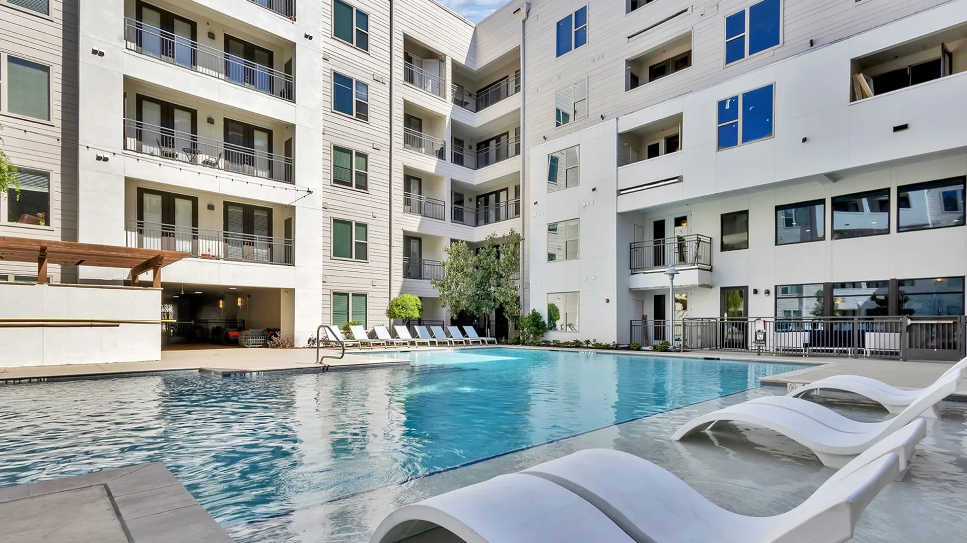 resort style pool with sun deck