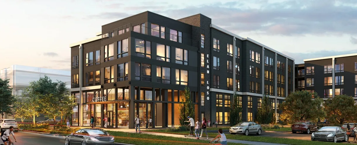 The exterior of Elan LoSo Apartments in Southwest Charlotte, NC, featuring a modern facade with large windows.