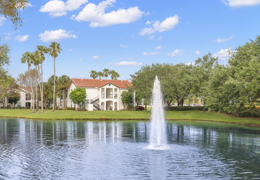 Outdoor exterior photo of pond and fountain