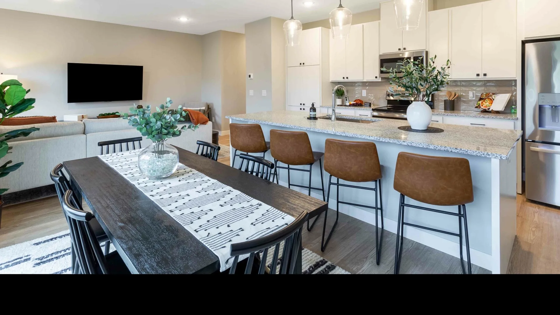 kitchen with granite counters and white cabinets