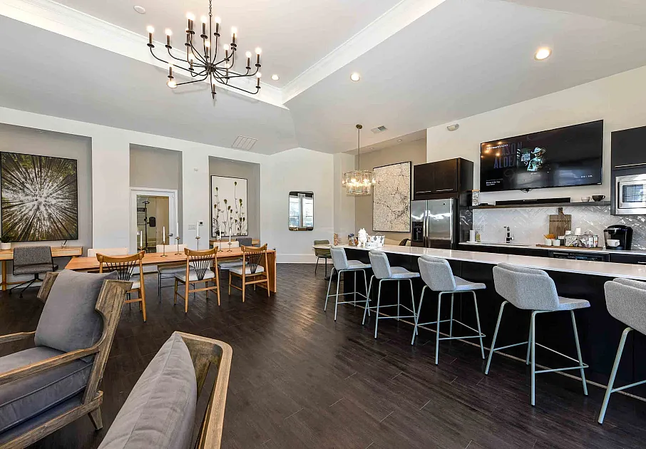 Community center with ample seating and kitchenette.
