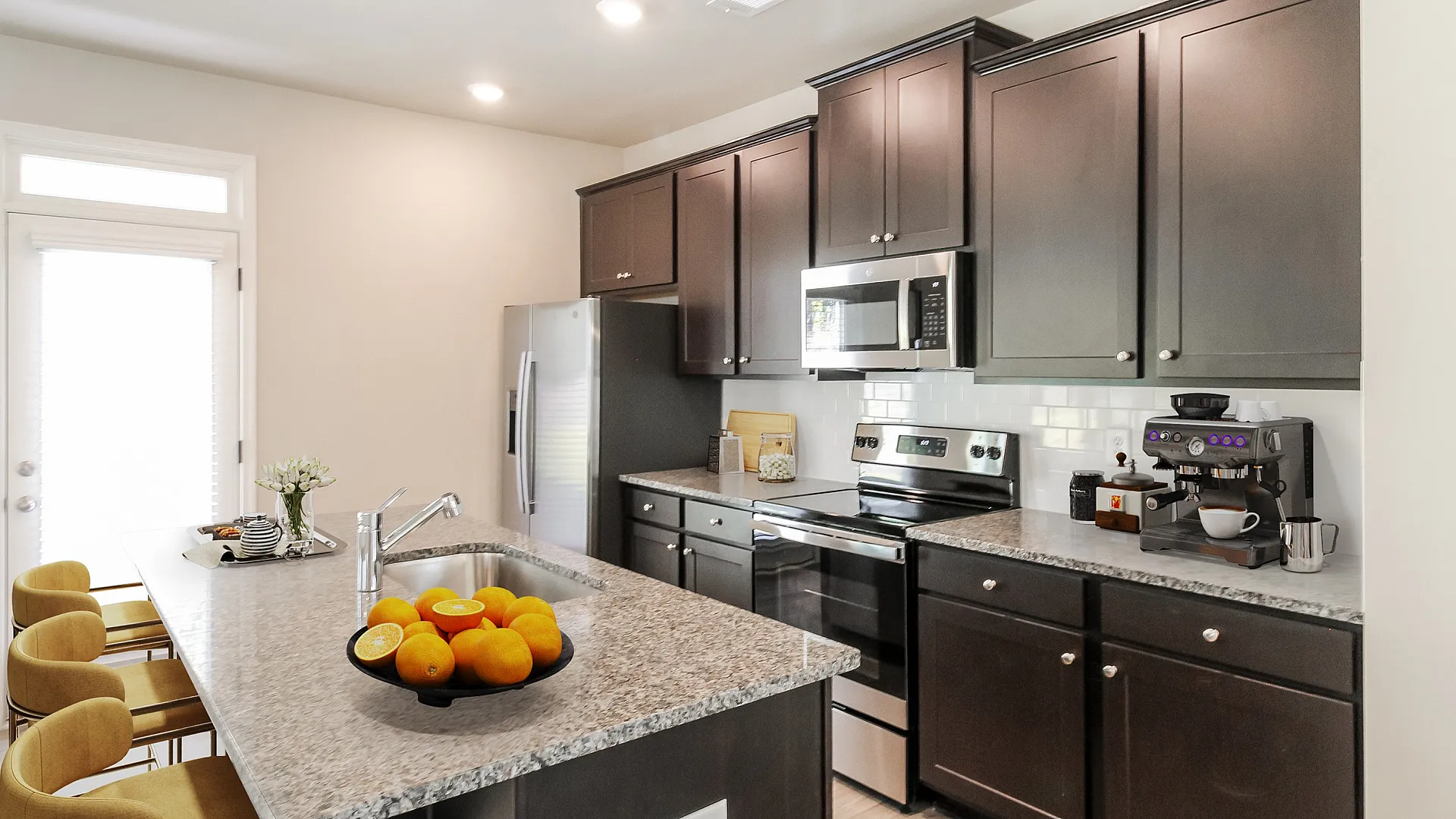 kitchen with brown cabinets and island