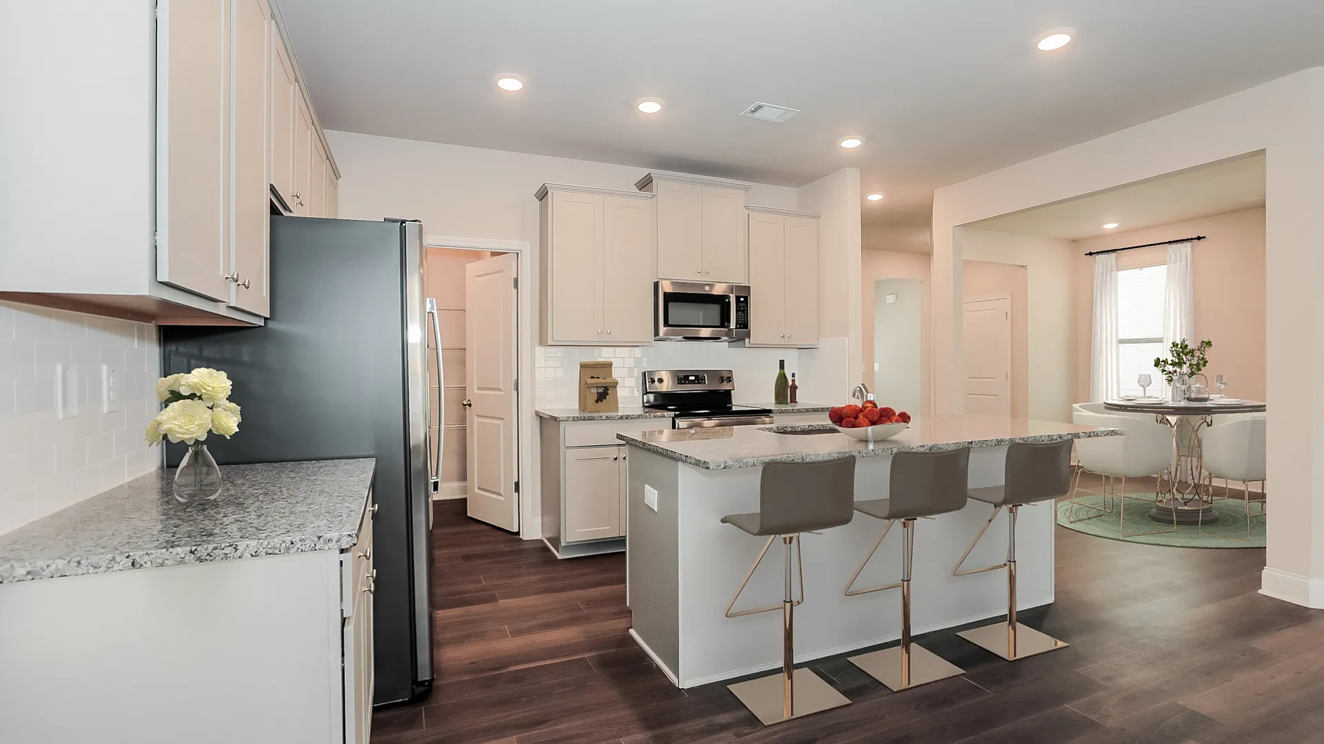 kitchen with white cabinets and island