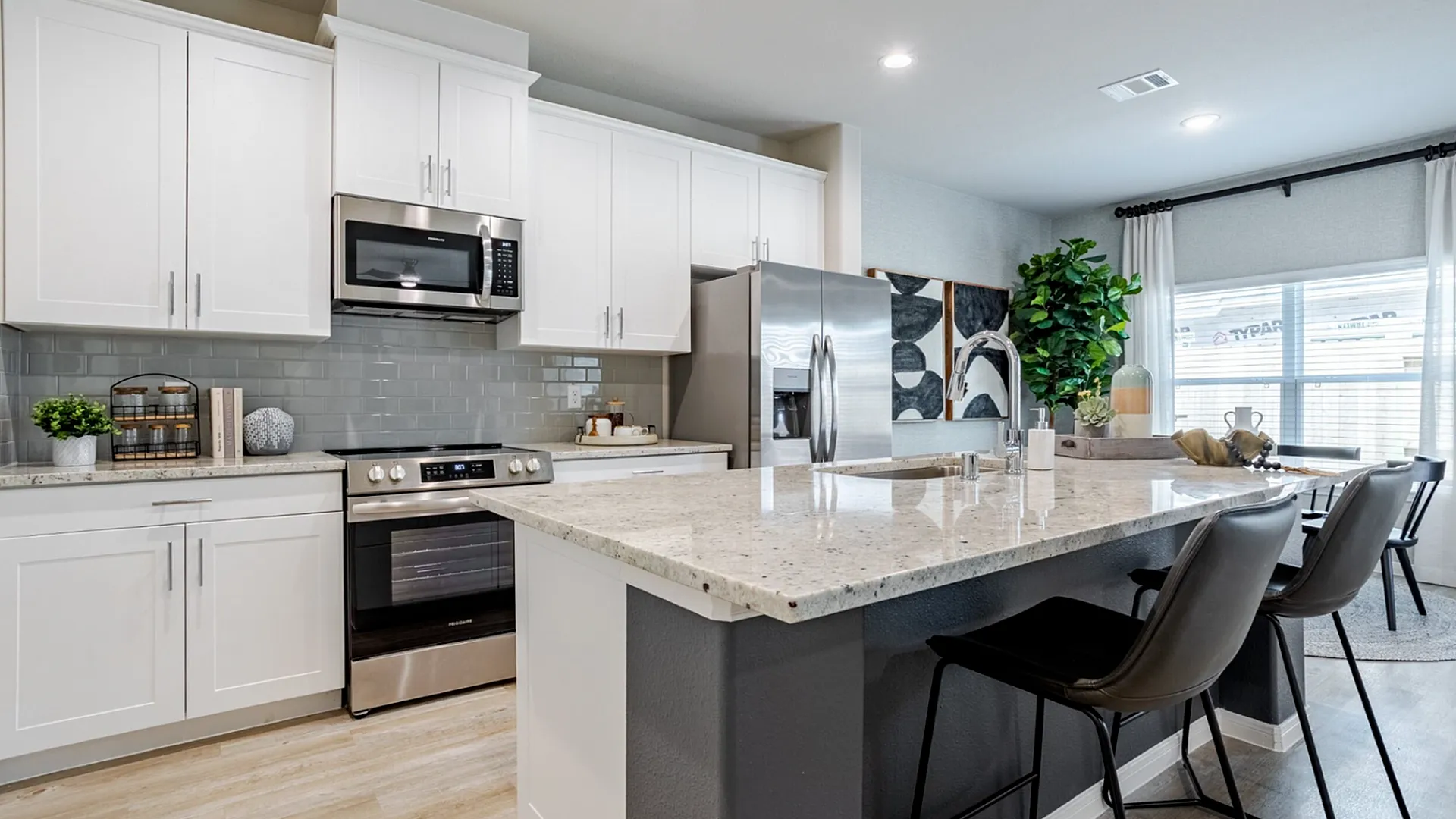 kitchen with island and dining room