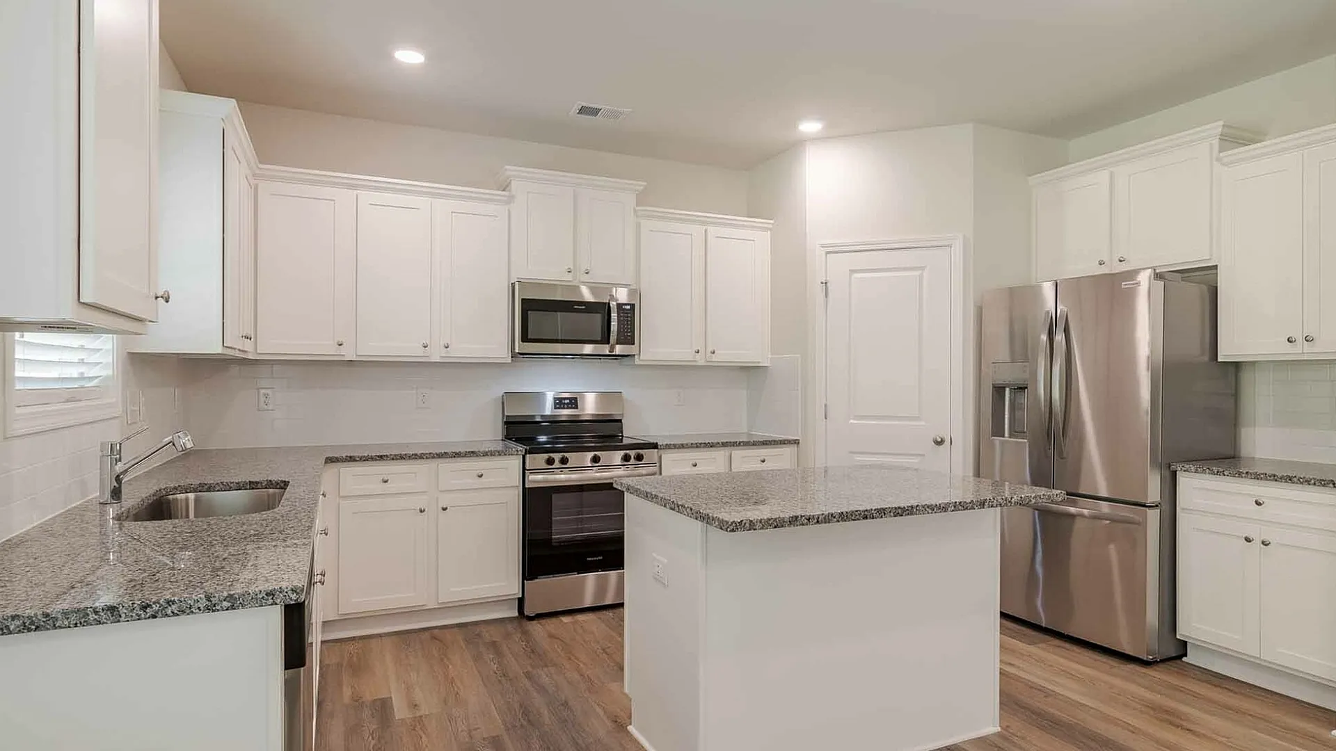 kitchen with white cabinets