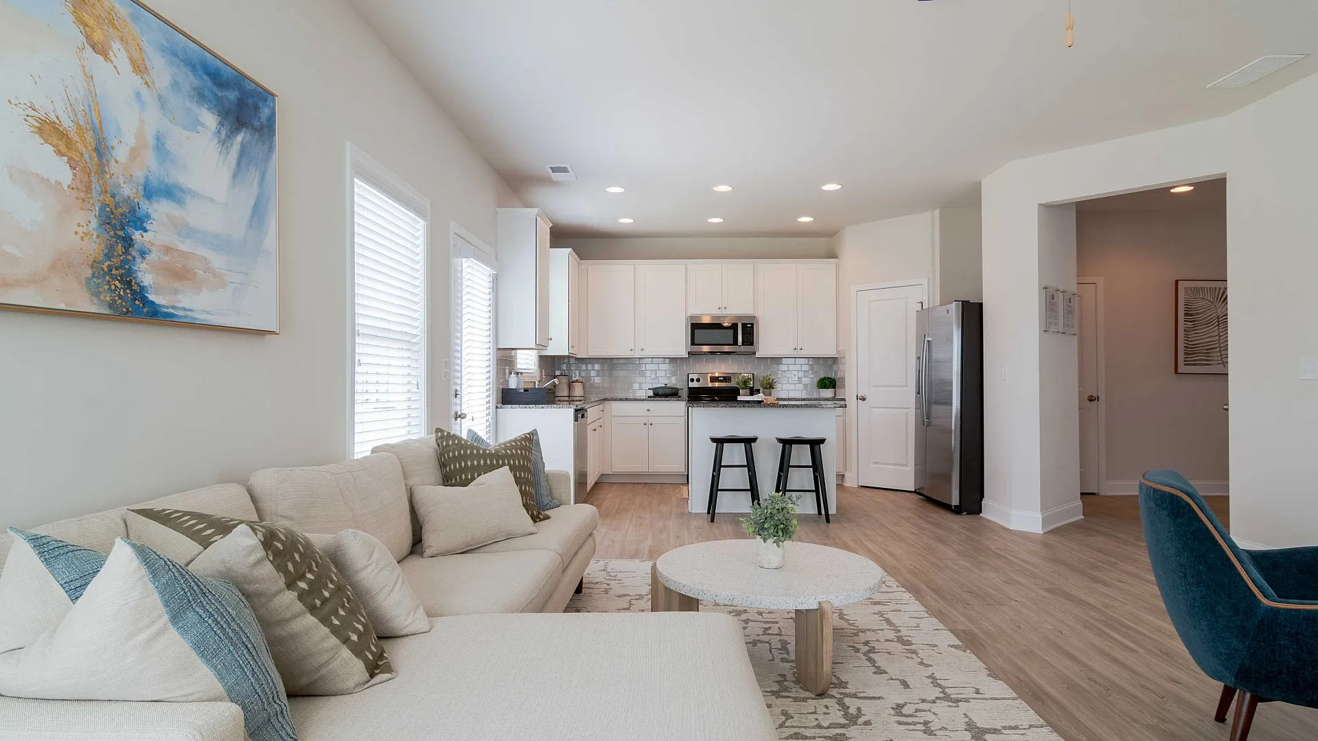 living room and kitchen with island