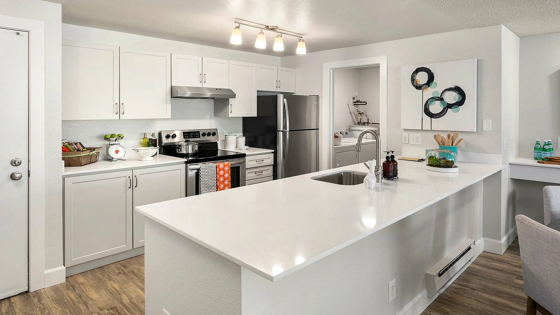 white large kitchen island with white cabinets