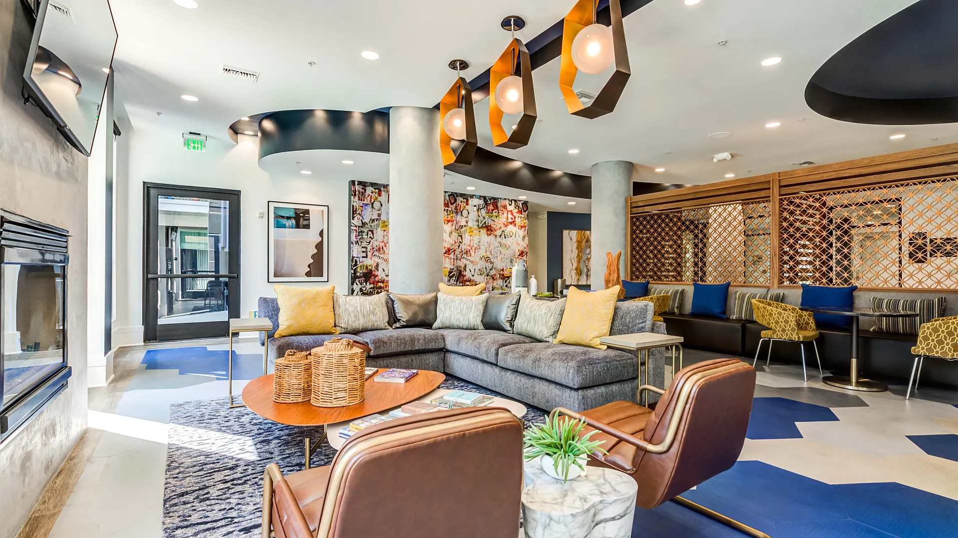 Luxurious apartment complex with a sparkling swimming pool, stylish poolside loungers, and swaying palm trees, perfect for a relaxing retreat.