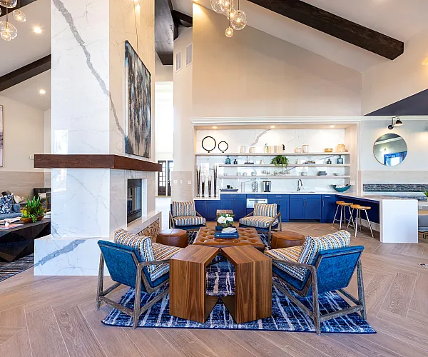Cozy club house featuring modern decor and high ceilings