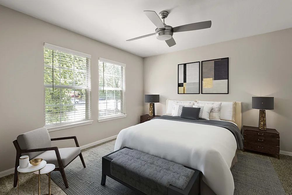 Bright and modern bedroom with elegant decor, featuring a luxurious bed, stylish lamps, large windows, and contemporary art on walls.