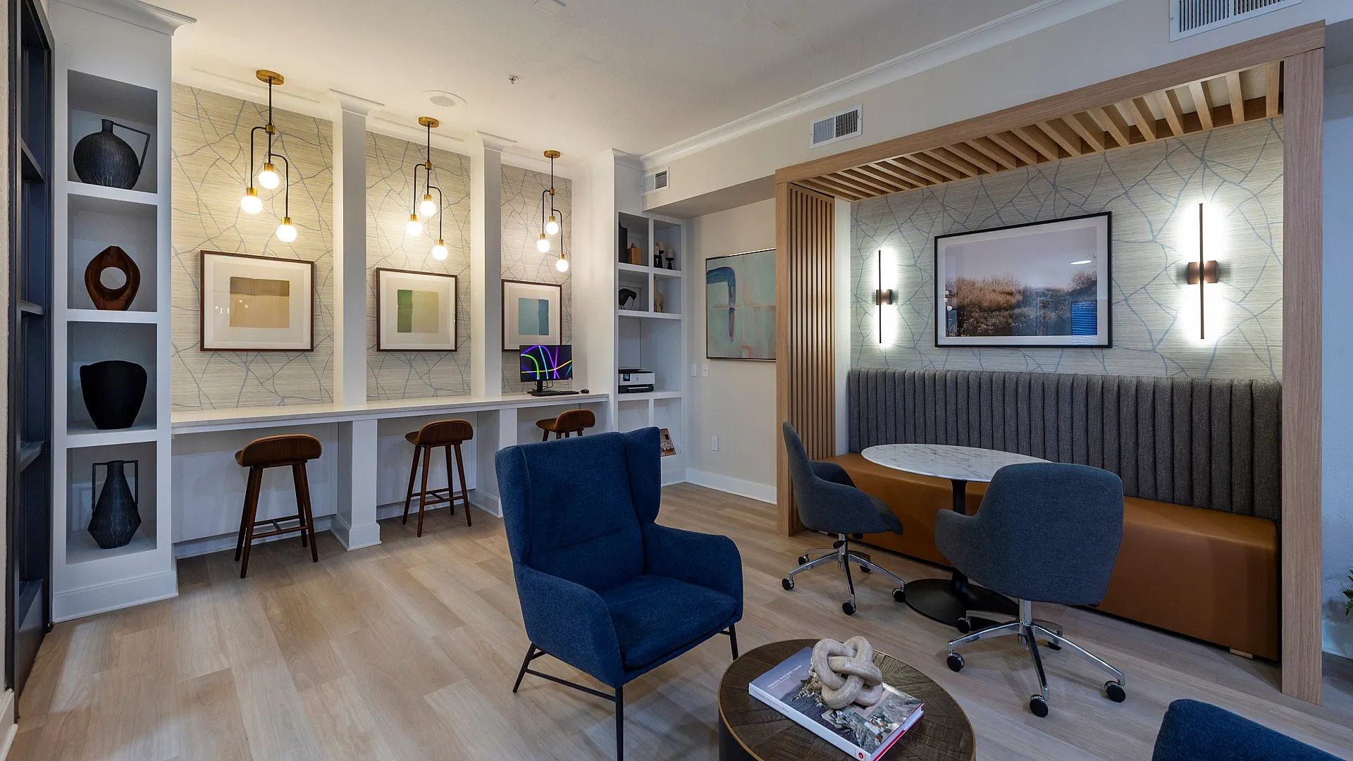 Stylish community lounge featuring modern seating, ambient lighting, and contemporary decor. Ideal for relaxation and social gatherings.