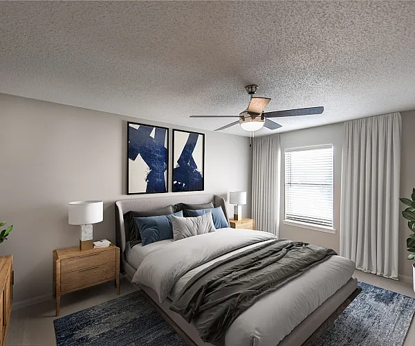 Bright and modern bedroom featuring a cozy bed with stylish blue and gray accents, elegant wooden furniture, and lush greenery.
