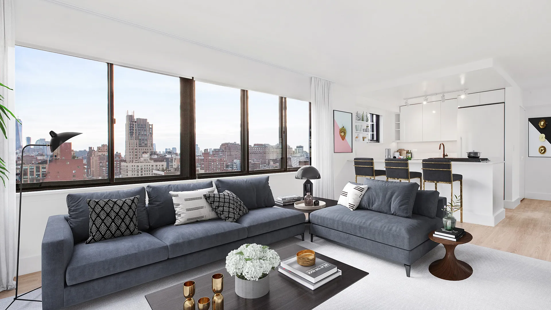 Luxurious open-concept living room with panoramic city views, featuring plush grey sofas, stylish decor, and a modern kitchen with sleek bar seating.