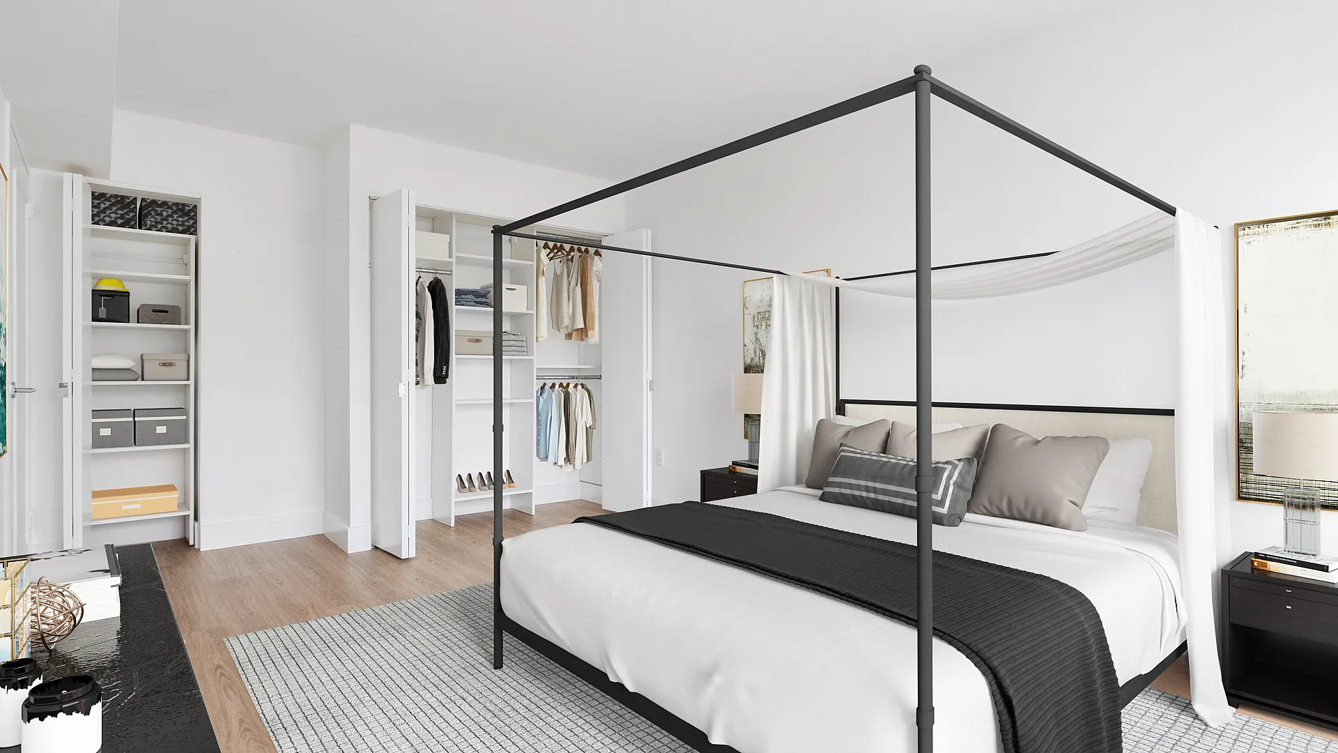 Elegant bedroom with a four-poster bed, modern decor, and spacious closets showcasing organized storage.