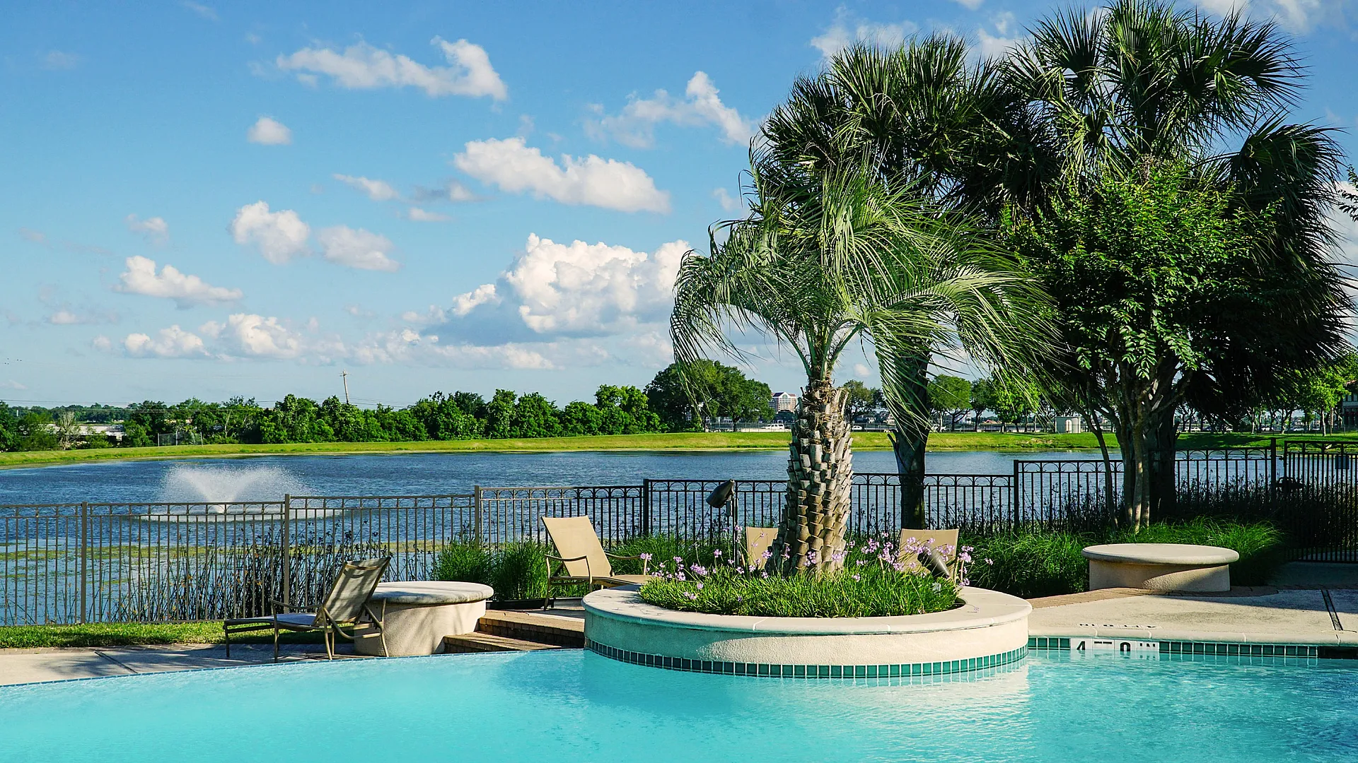 Pool with view of lake