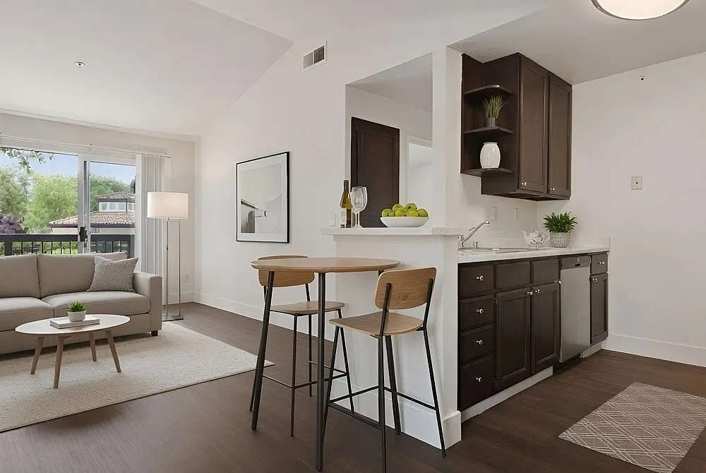 Inviting open-plan apartment featuring a cozy living area, sleek kitchen, and elegant hardwood floors with ample natural light.