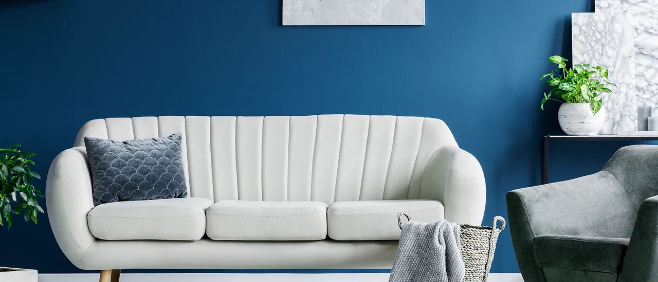 White Couch, Blue Wall