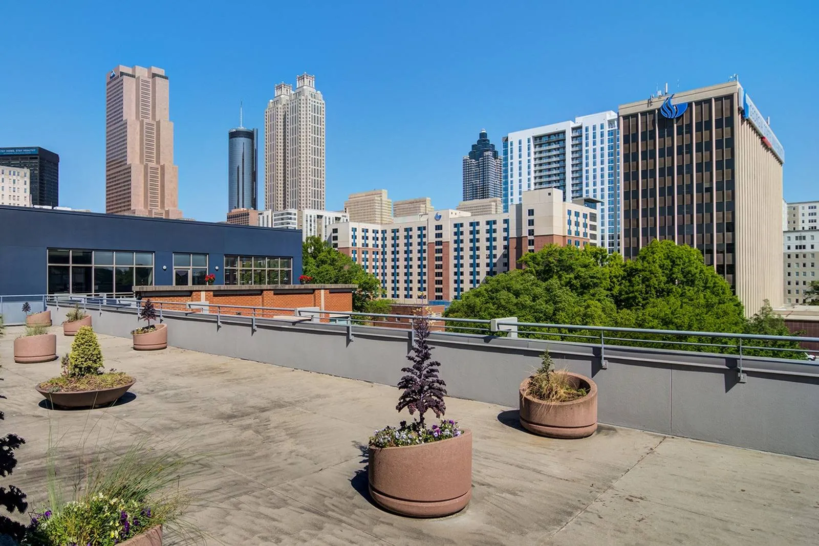 Spacious rooftop deck with skyline views