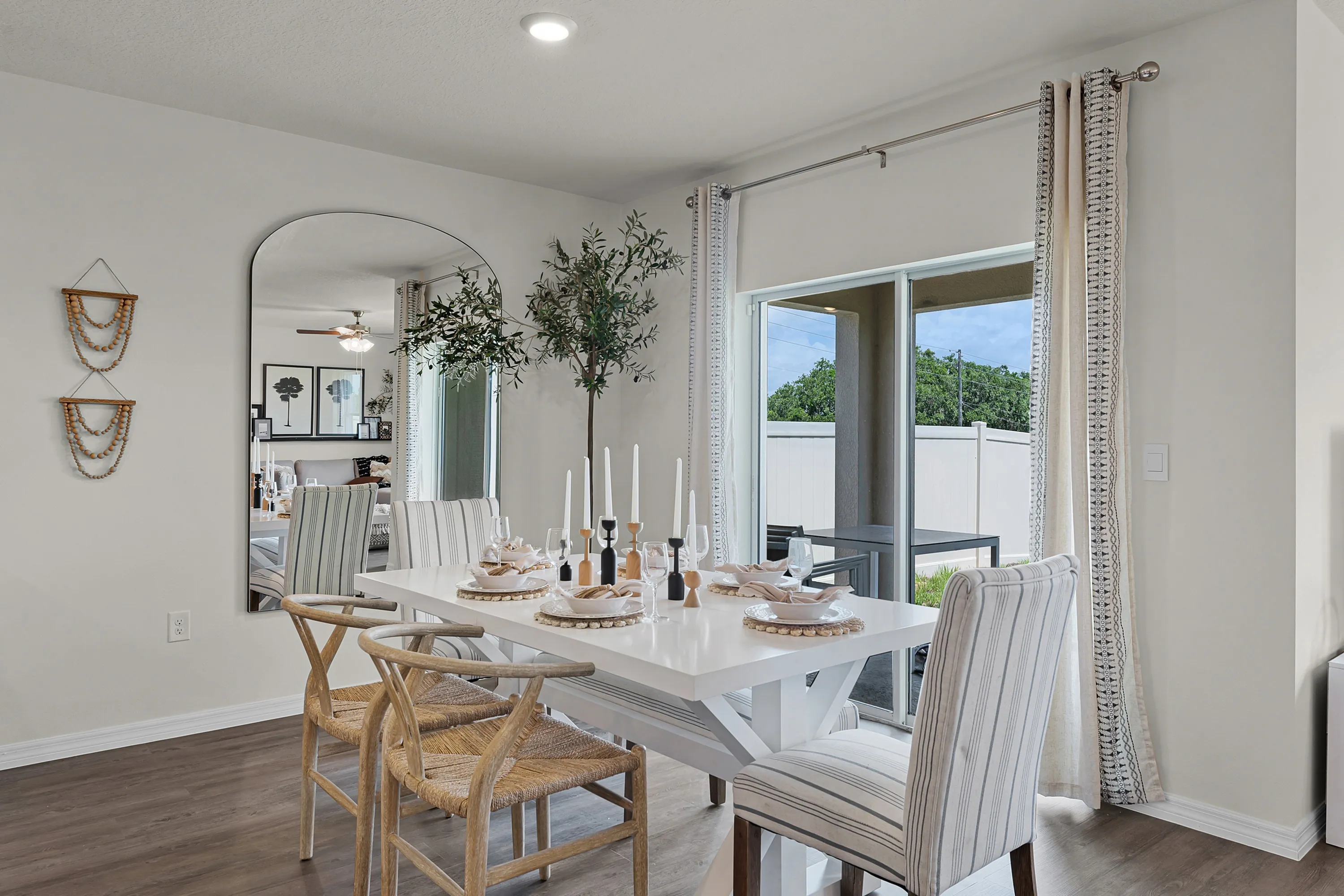 Stylish dining area with natural light and patio access.