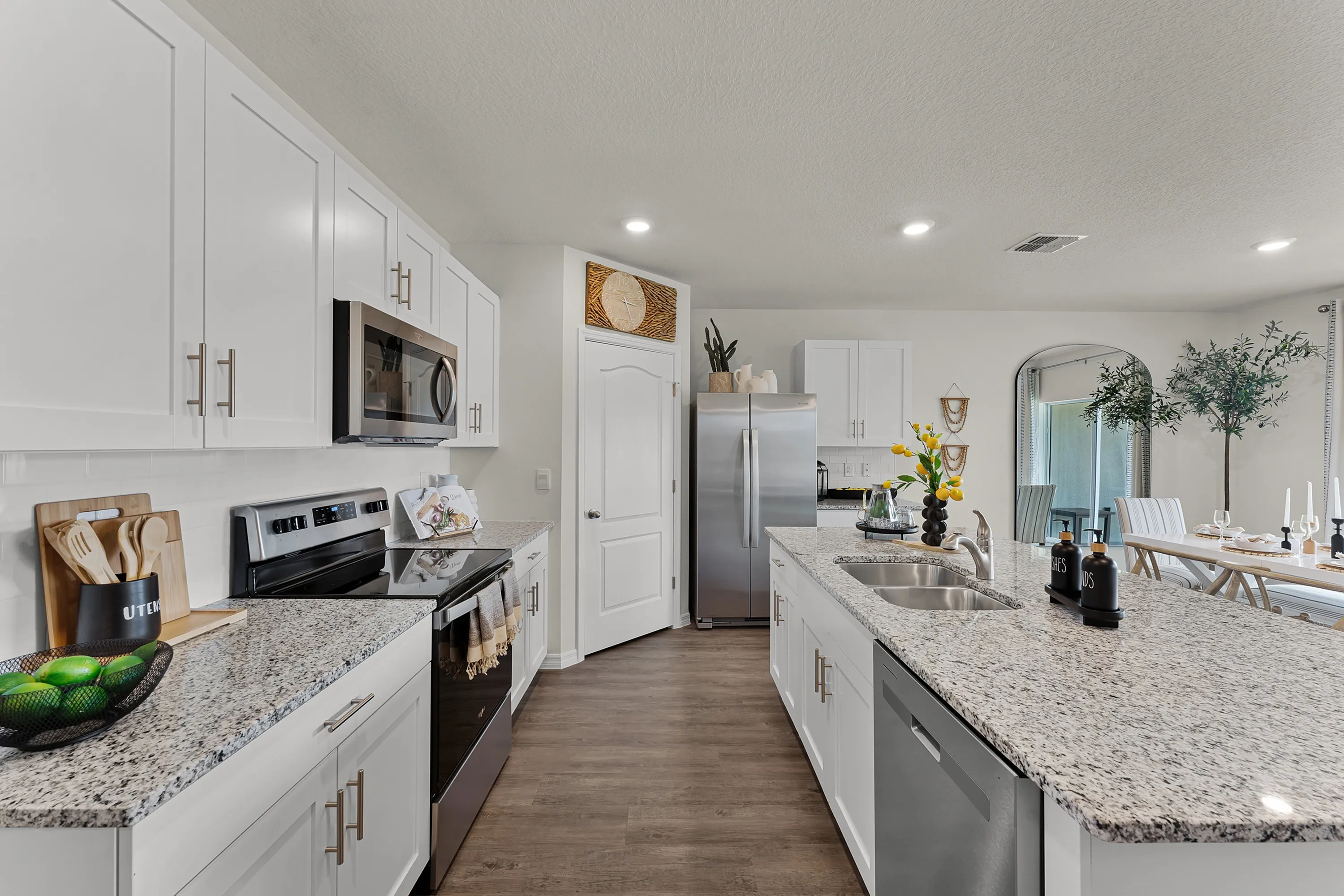 Fully equipped kitchen with granite countertops and sleek finishes.