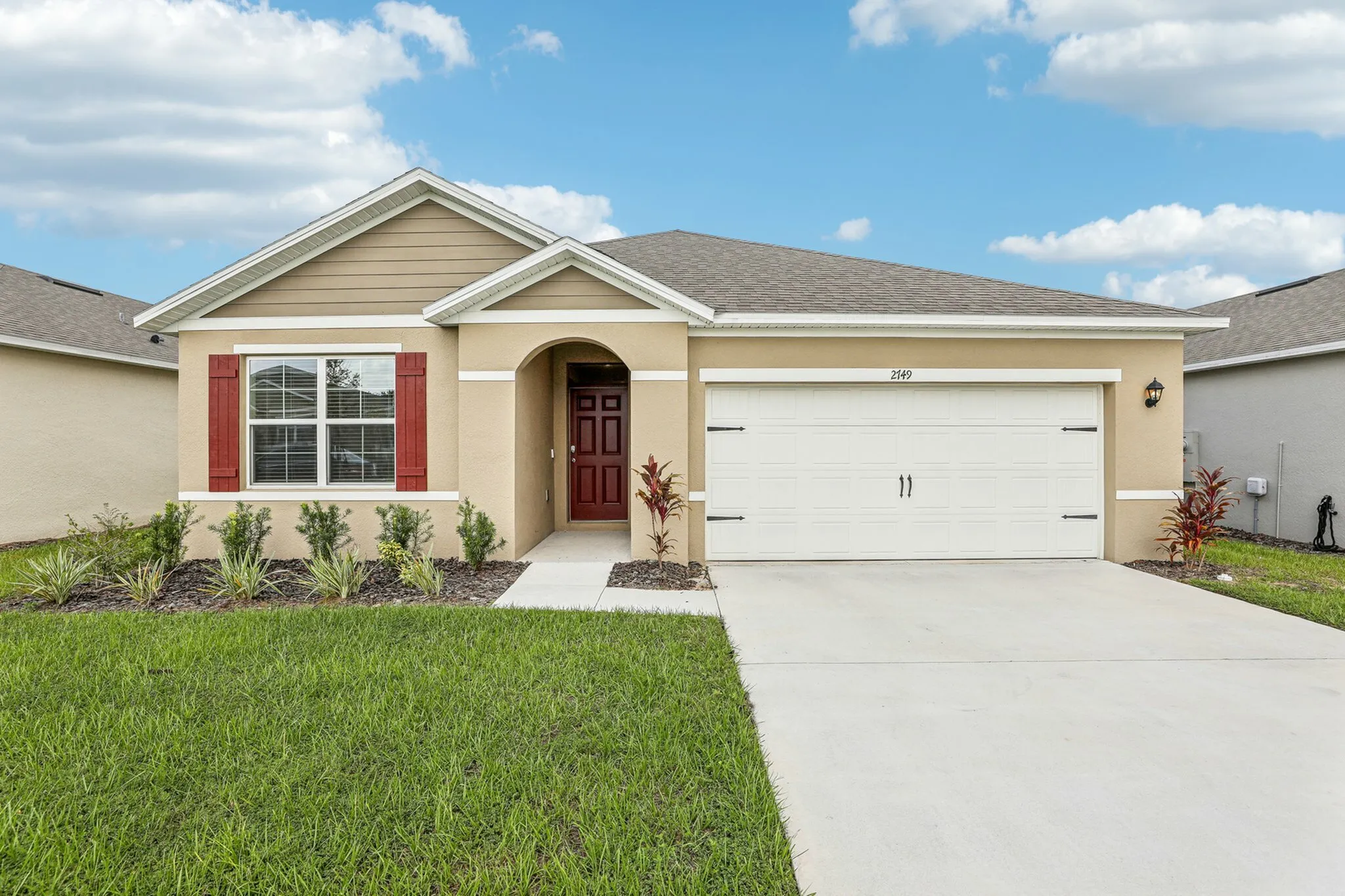 Modern 3/2 single-story home with private driveway and charming curb appeal.