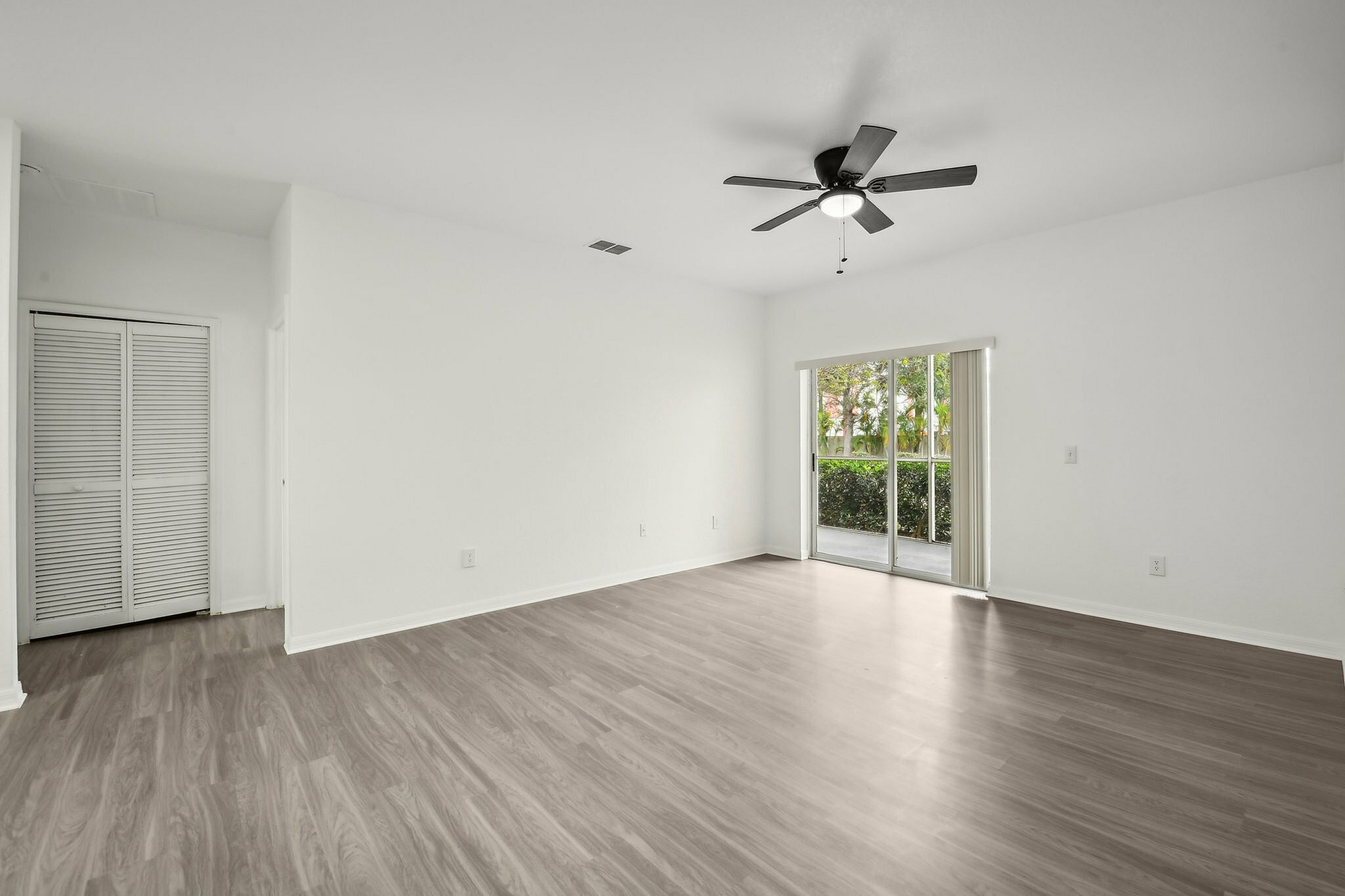 interior pic of deluxe unit with gray planking and white walls