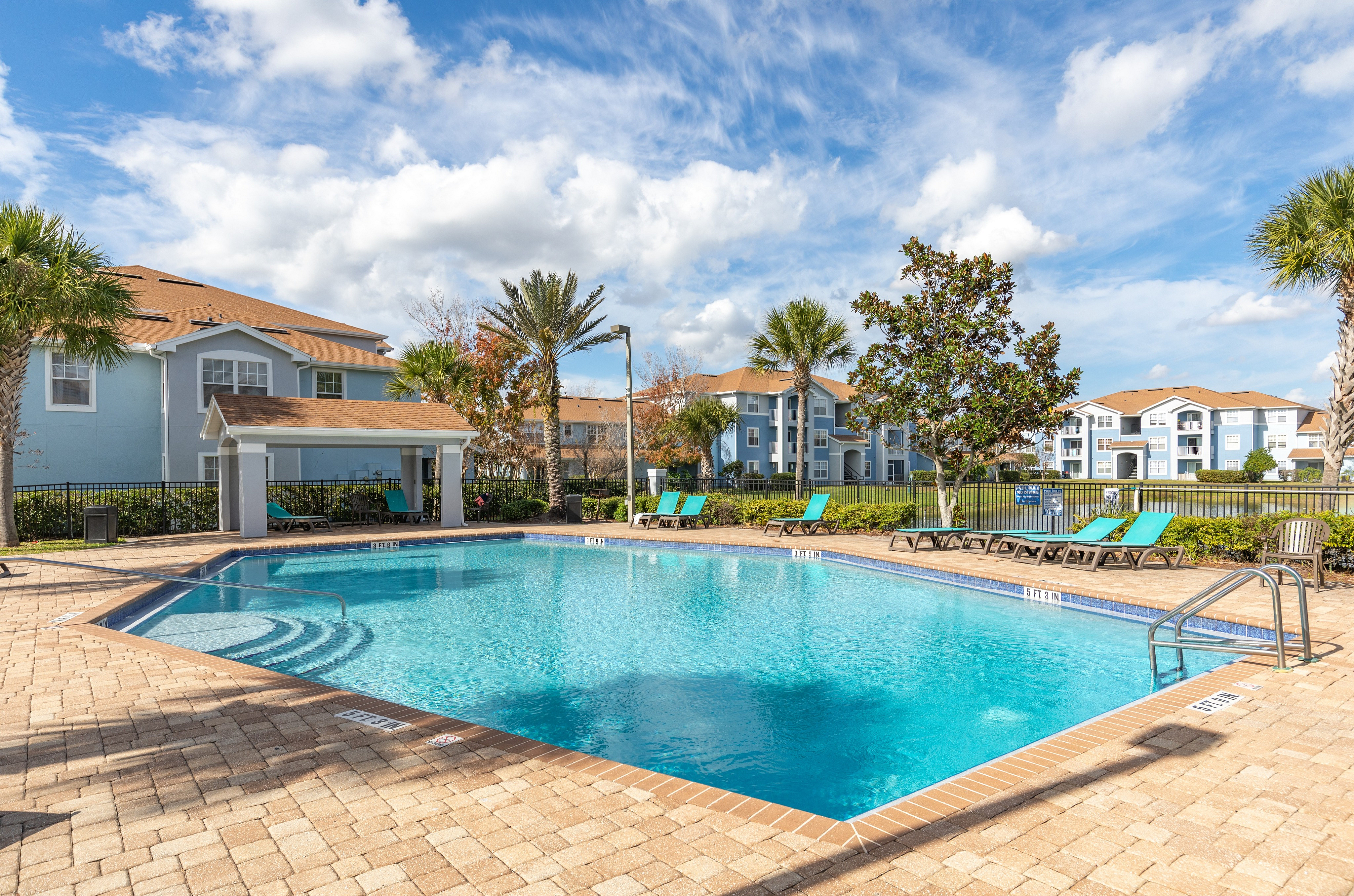 Sparkling pool with plenty of space to relax.
