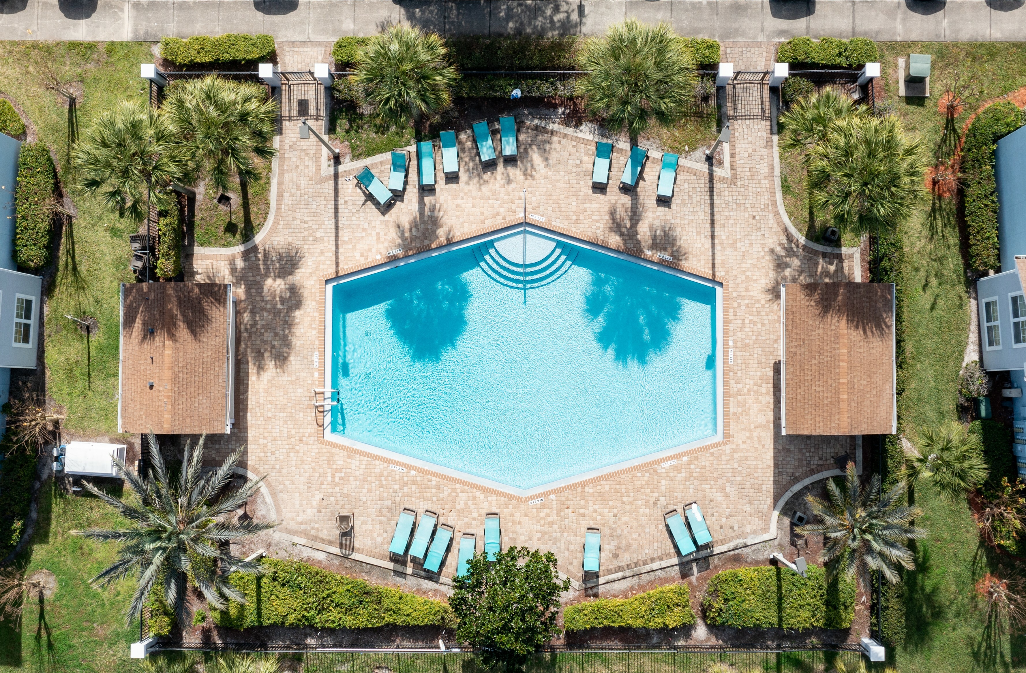 Aerial view of the resort-style swimming pool and sundeck.